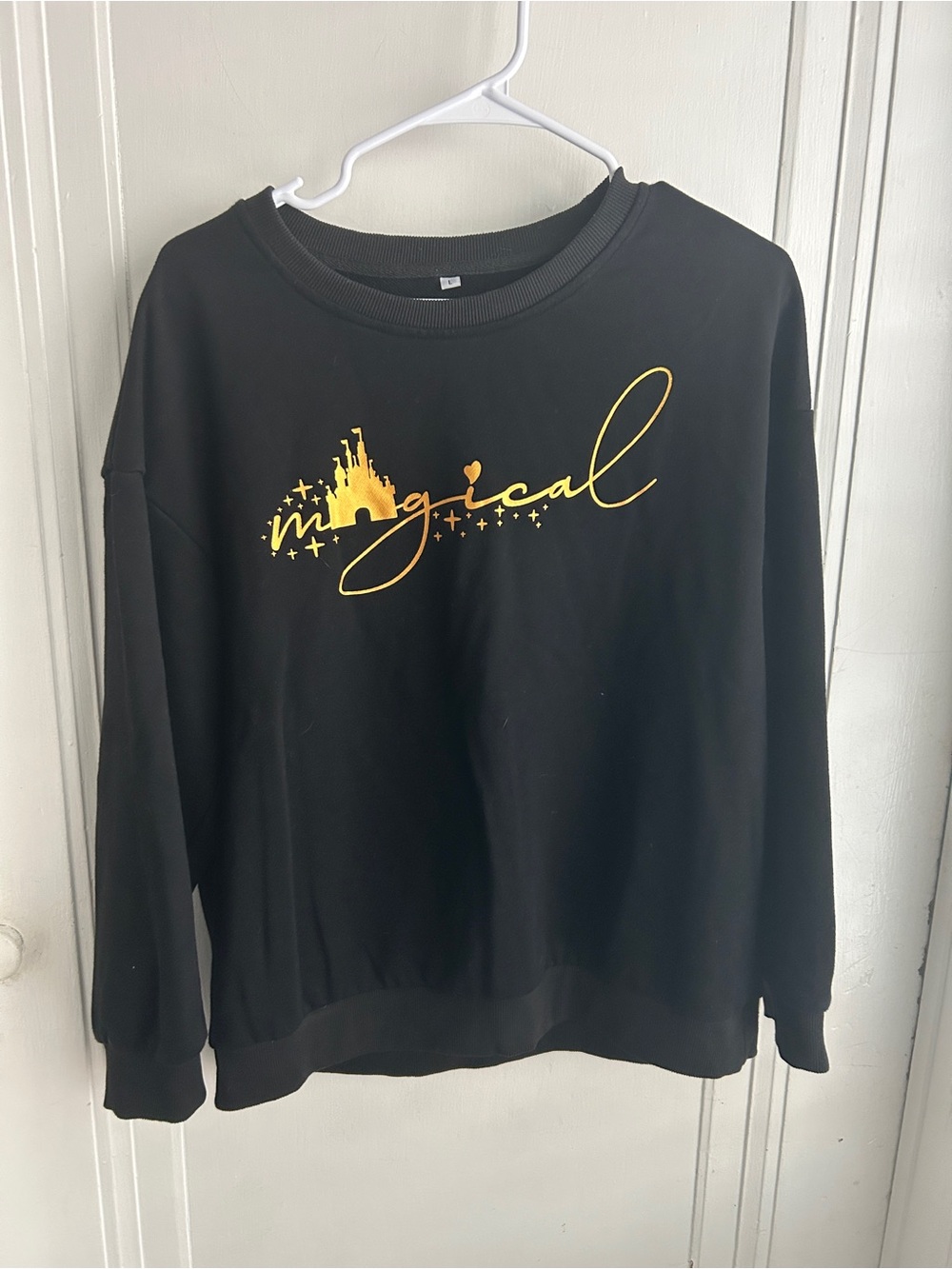 Magical Script Black Sweatshirt with Gold Print